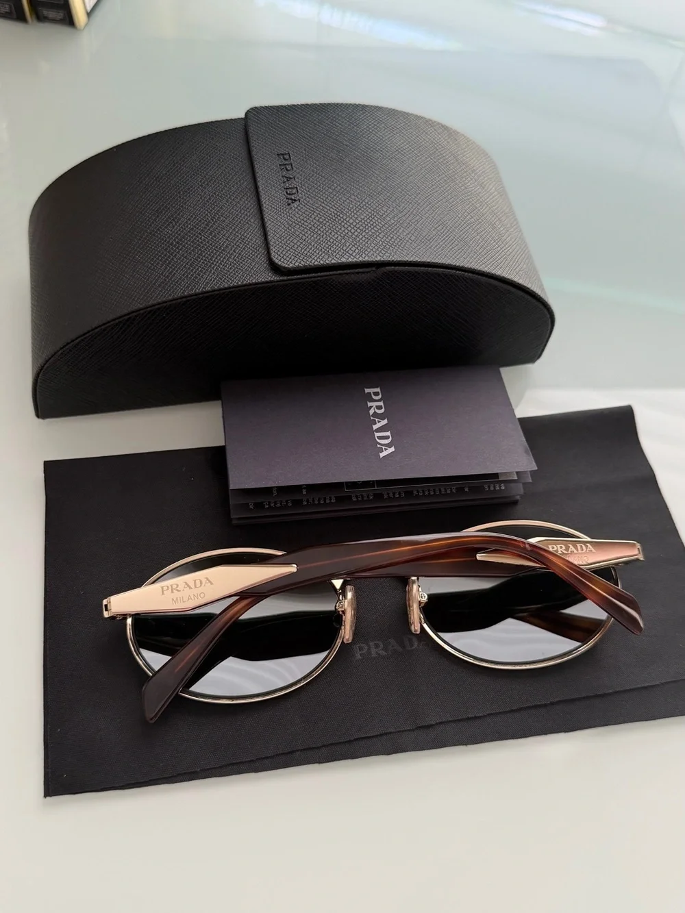 Prada Gold Frame Sunglasses with Green Lenses